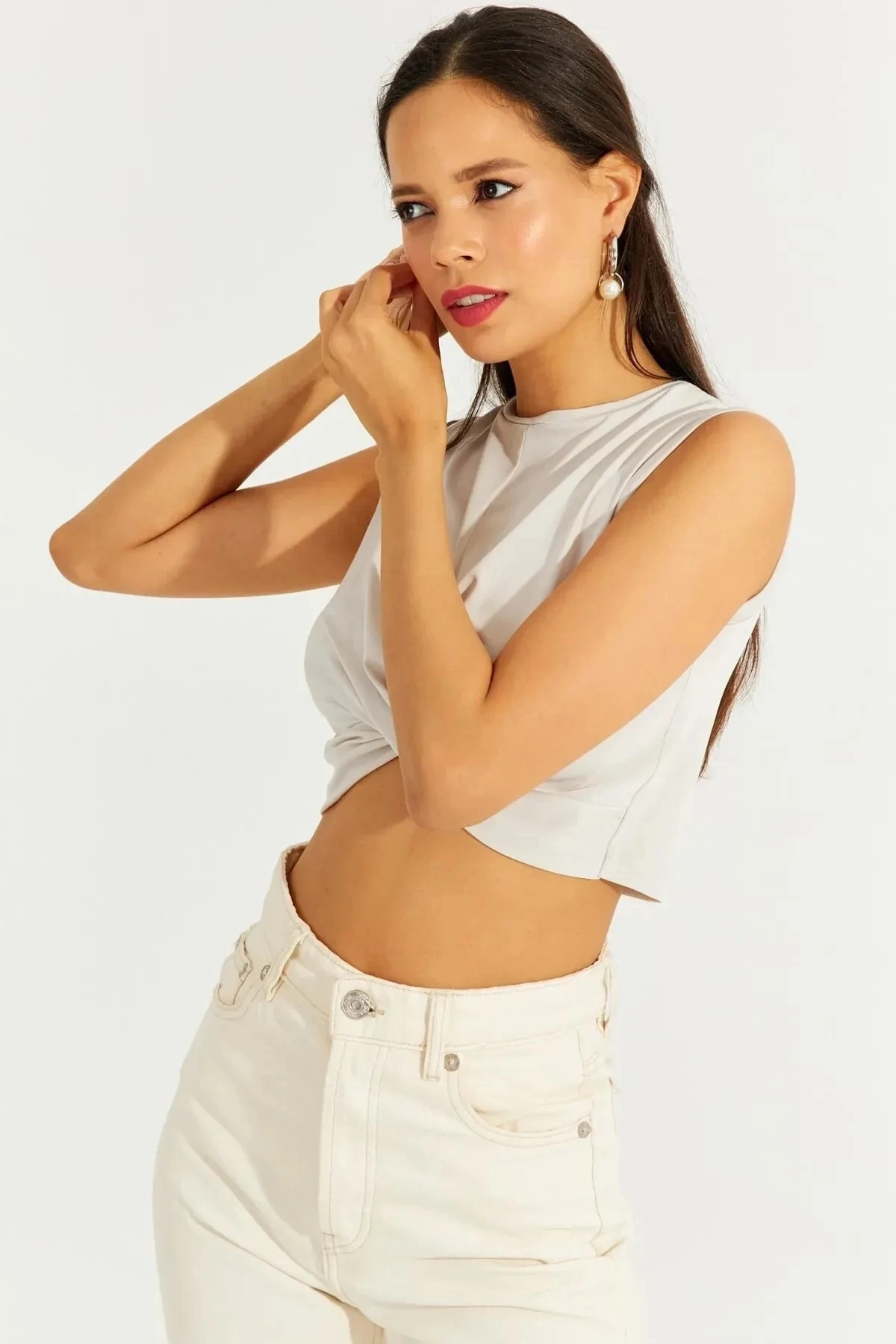 Kadın Bej Önü Düğümlü Bisiklet Yaka Sıfır Kol Likralı Crop Bluz HZL23S-SND120181