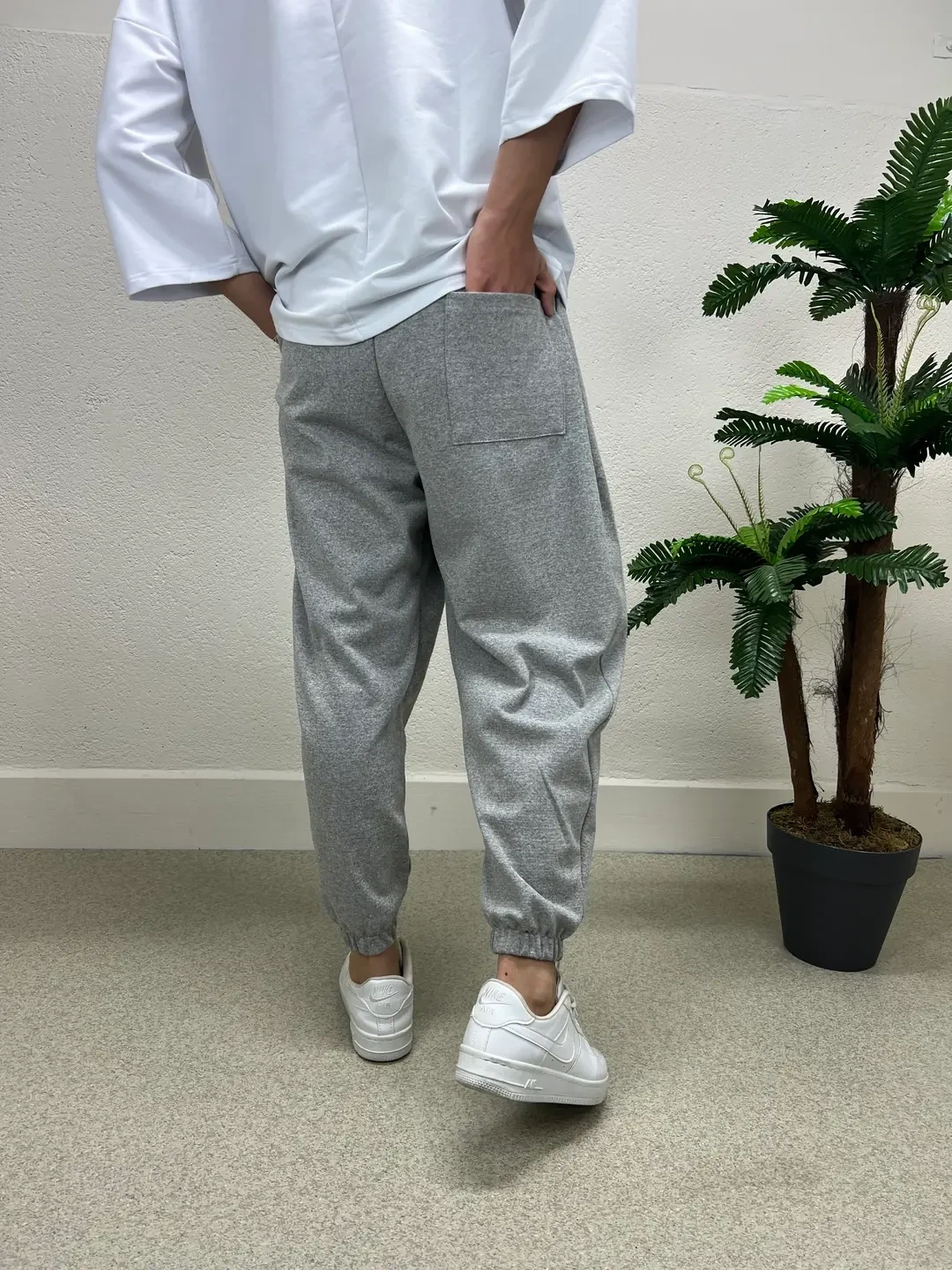 Erkek Açık Gri Beli ve Paçası Lastikli Bol Kesim Cepli Jogger Eşofman Altı HZL24S-MXC8989-211