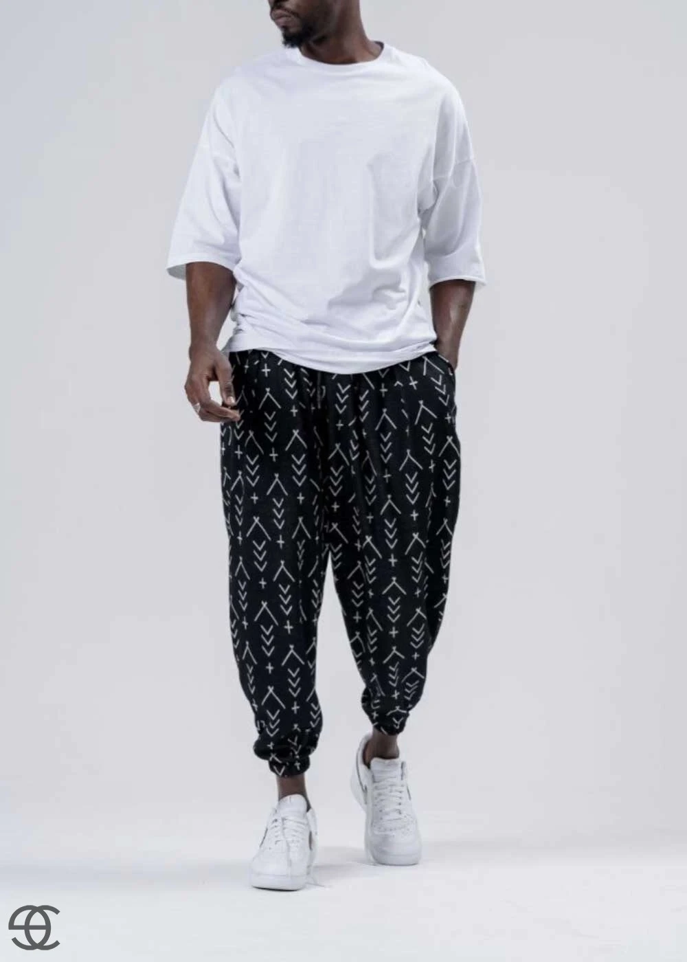Erkek Siyah Küçük Desenli Beli ve Paçası Lastikli Bol Kesim Jogger Eşofman Altı HZL24S-MXC8989-164