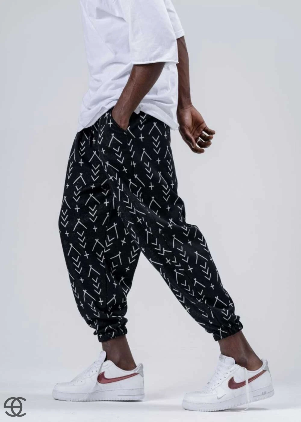 Erkek Siyah Küçük Desenli Beli ve Paçası Lastikli Bol Kesim Jogger Eşofman Altı HZL24S-MXC8989-164