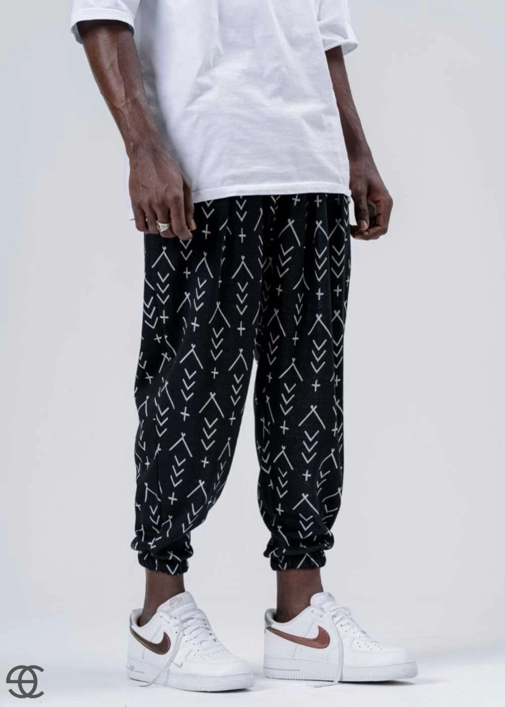Erkek Siyah Küçük Desenli Beli ve Paçası Lastikli Bol Kesim Jogger Eşofman Altı HZL24S-MXC8989-164