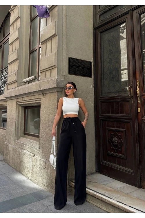 Kadın Siyah Yüksel Bel Lastikli Beli Bağlamalı Cepli Geniş Paça Pantolon HZL24S-VL191151