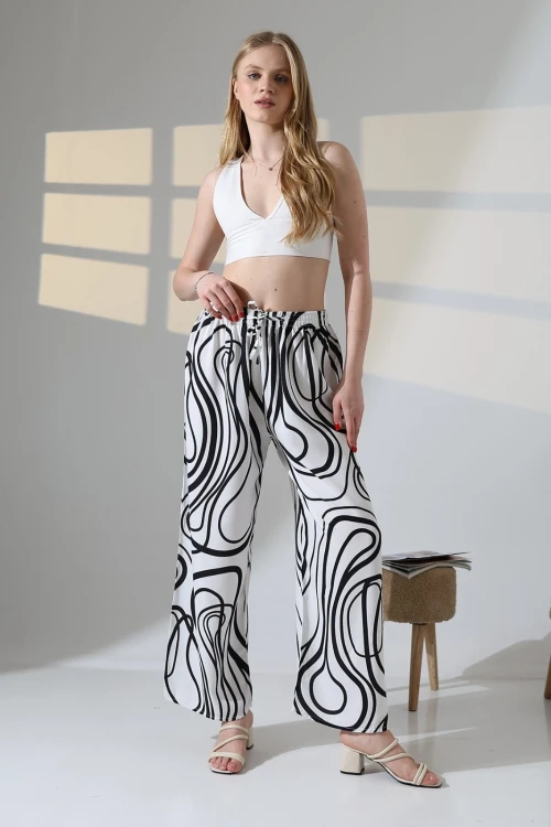 Kadın Beyaz Desenli Beli Lastikli Cepsiz Bol Kesim Viskon Pantolon HZL25S-DSB17771